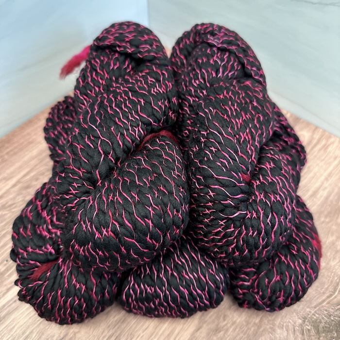 Malabrigo Carocol on Black 093 Fucsia on Black Sold at Fearless Fibers, LLC