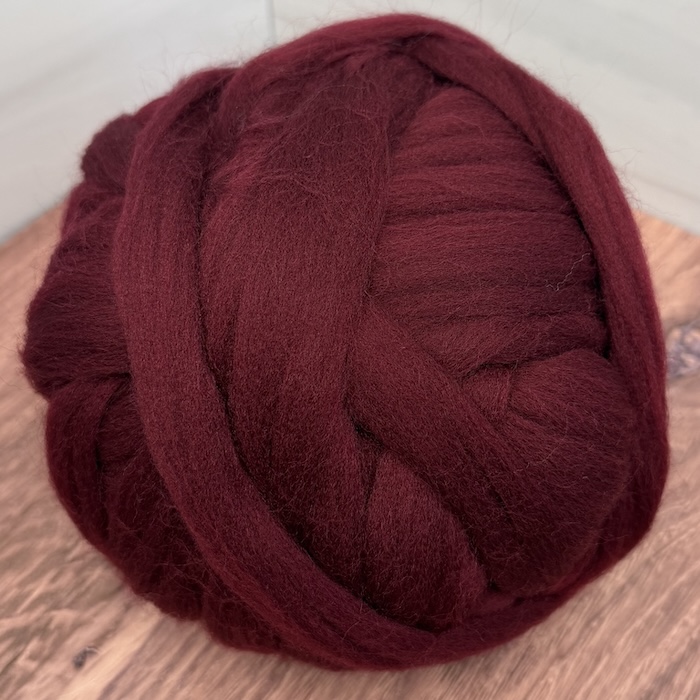 Brown Sheep Dyed Wool Roving 18 Bing Cherry, solid combed top.