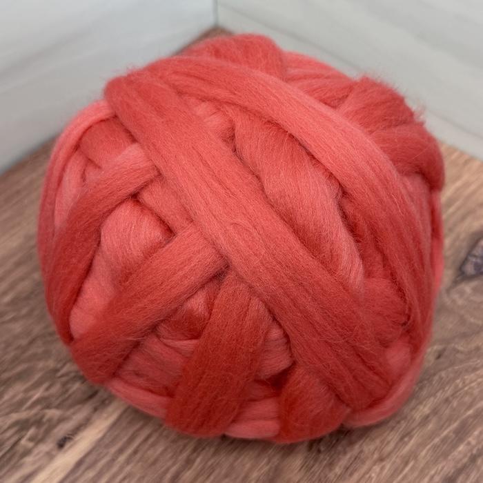 Brown Sheep Dyed Wool Roving 24 Ripe Guava, solid combed top.